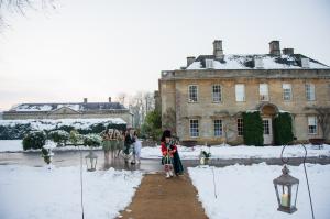 babington house wedding venue in winter with snow on the ground