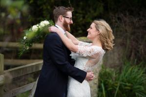 bride and groom at their clock barn in hampshire wedding