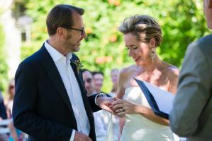 the exchange of rings at a wedding at Chateau Rigaud in France